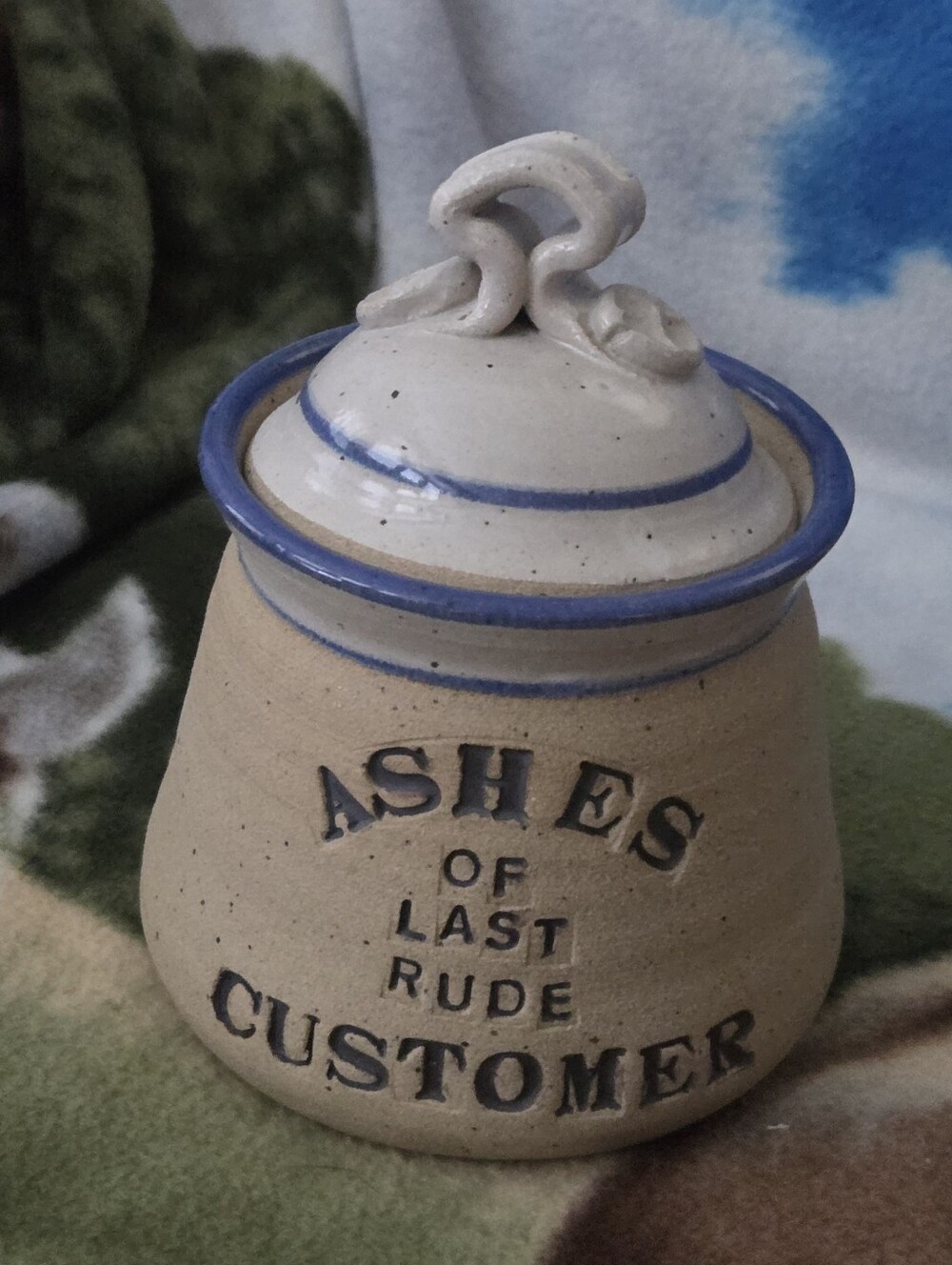 Ceramic 'Ashes of Last Rude Customer' Jar - Beige with Blue Trim